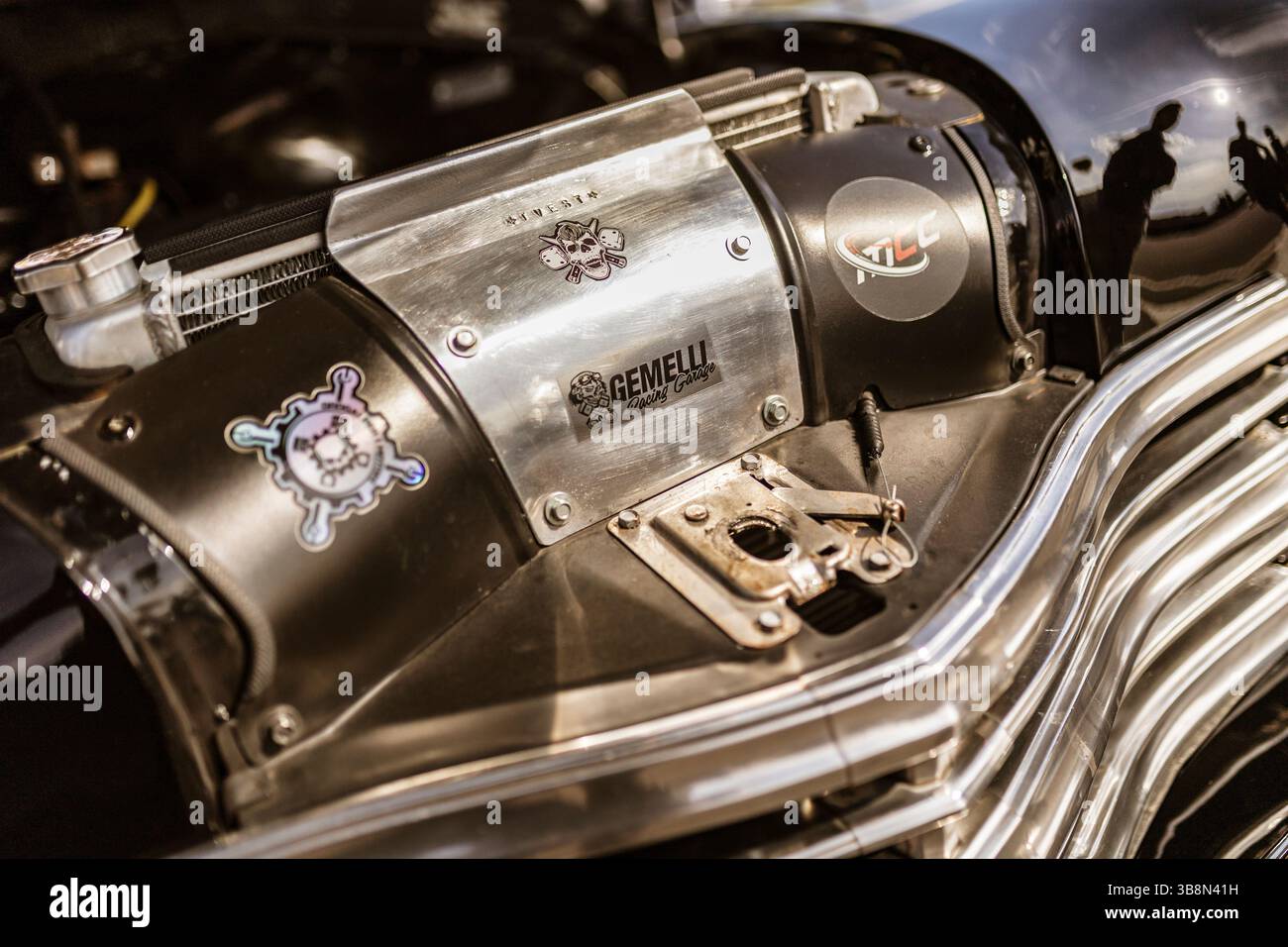 Rome, italy 4 may 2025: close-up of a tuned car engine featuring ...