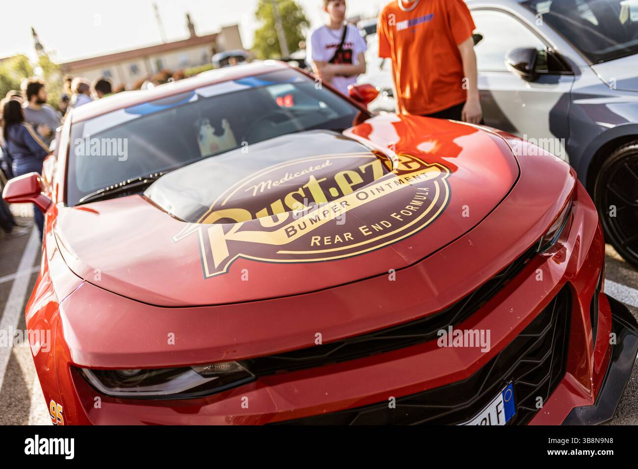Medicated Rust Eze Rome, italy 4 may 2025: close-up of a red chevrolet camaro with a rust ...