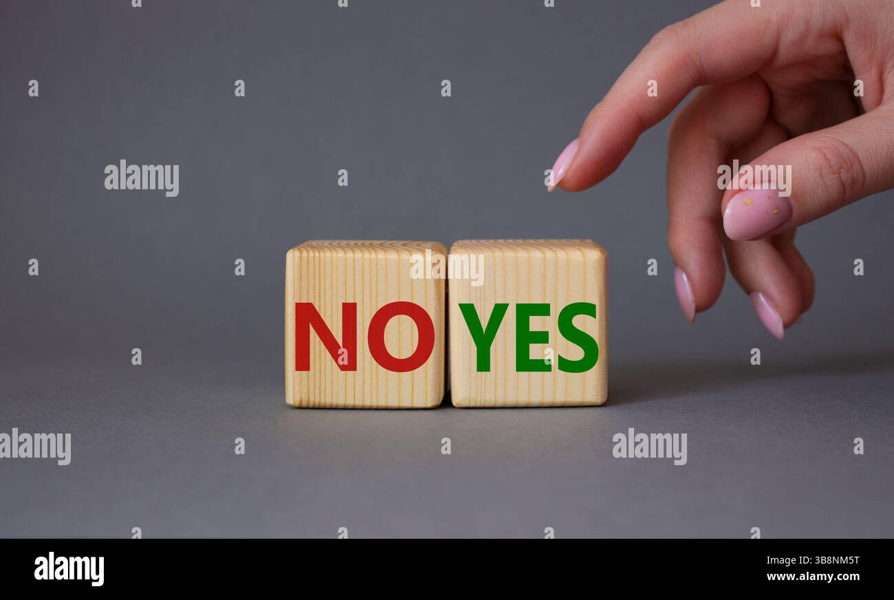 Yes vs No symbol. Businessman hand is making a choice between YES and ...