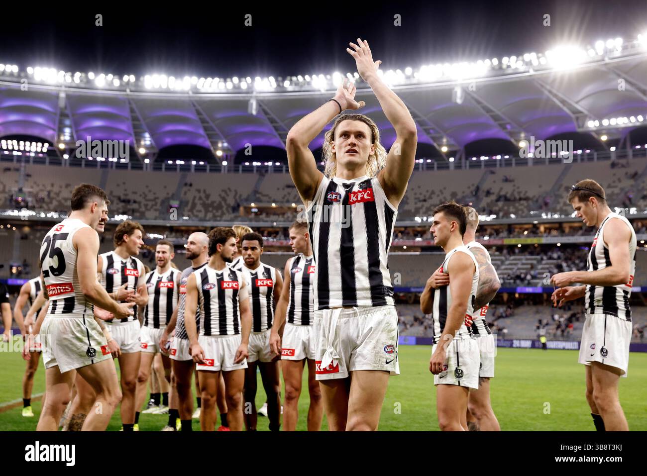 Perth, Australia. 08th May, 2025. Darcy Moore of the Magpies leads his