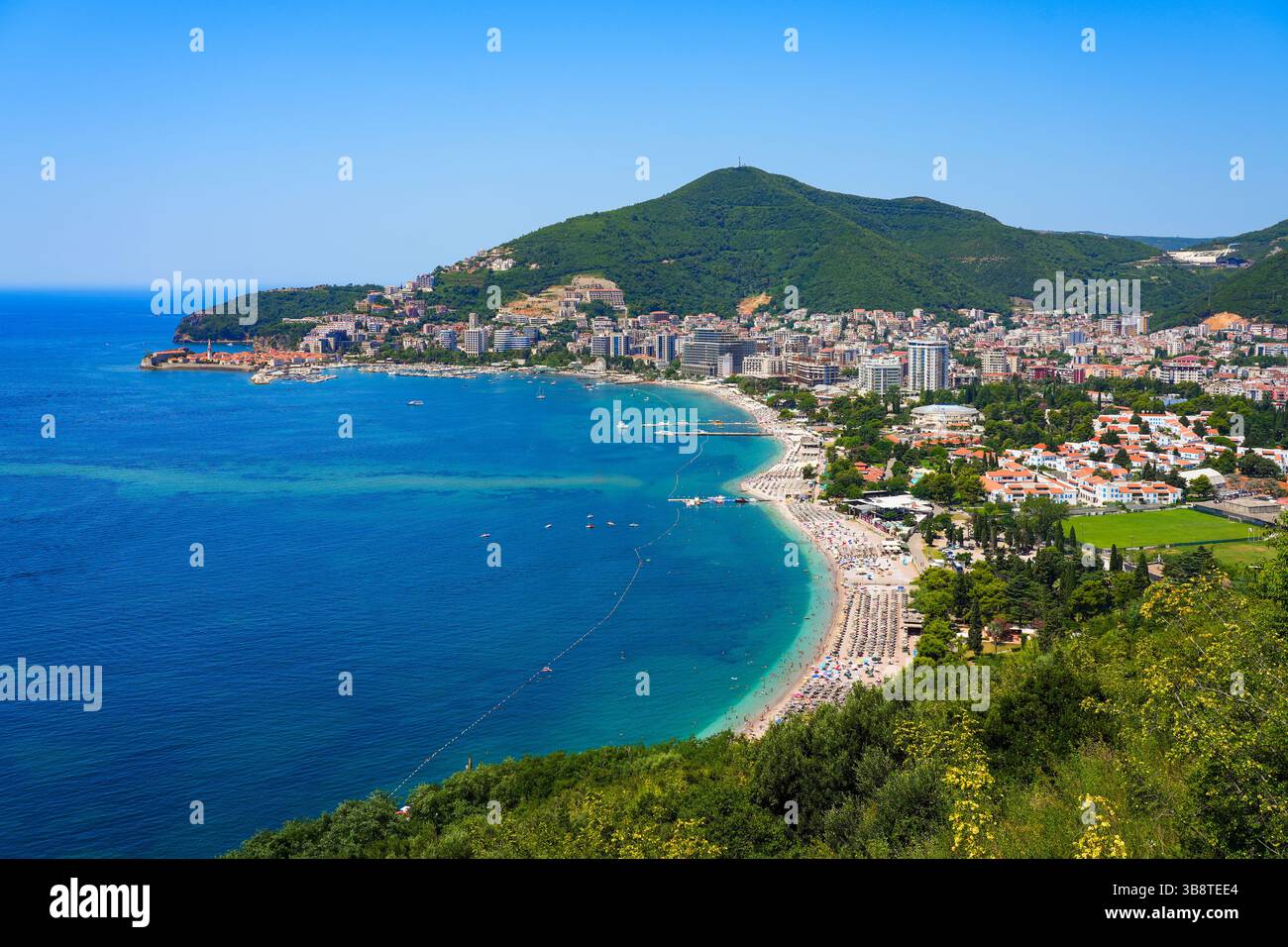 Aerial view of the beach of Budva, a famous resort town on the Montenegrin Riviera along the coast of the Adriatic Sea Stock Photo