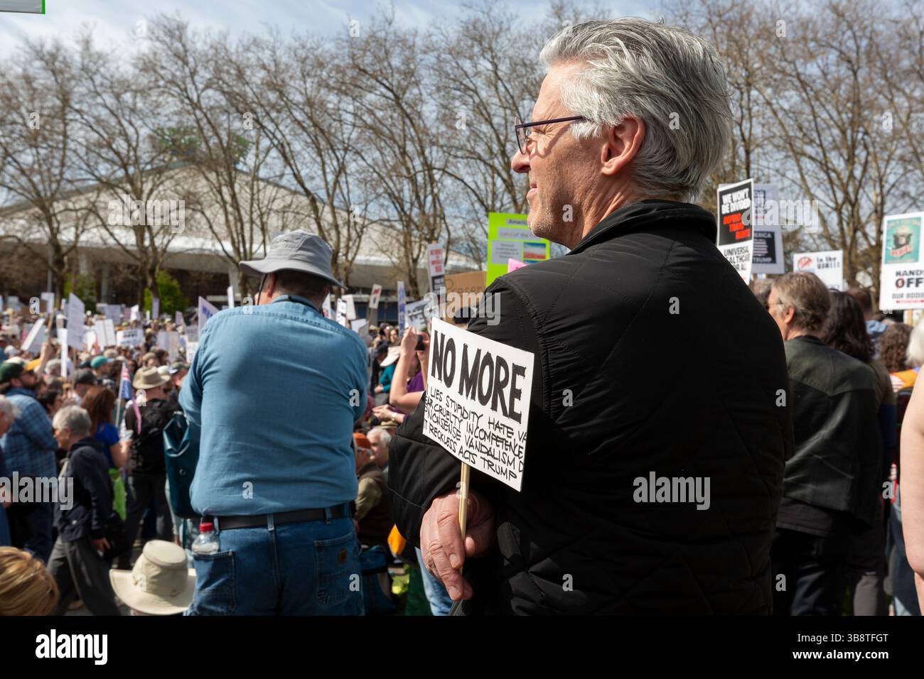 Thousands of protesters and supporters gather at Seattle Center for the “Hands Off!” rally in Seattle on Saturday, April 5, 2025. The protest is part Stock Photo