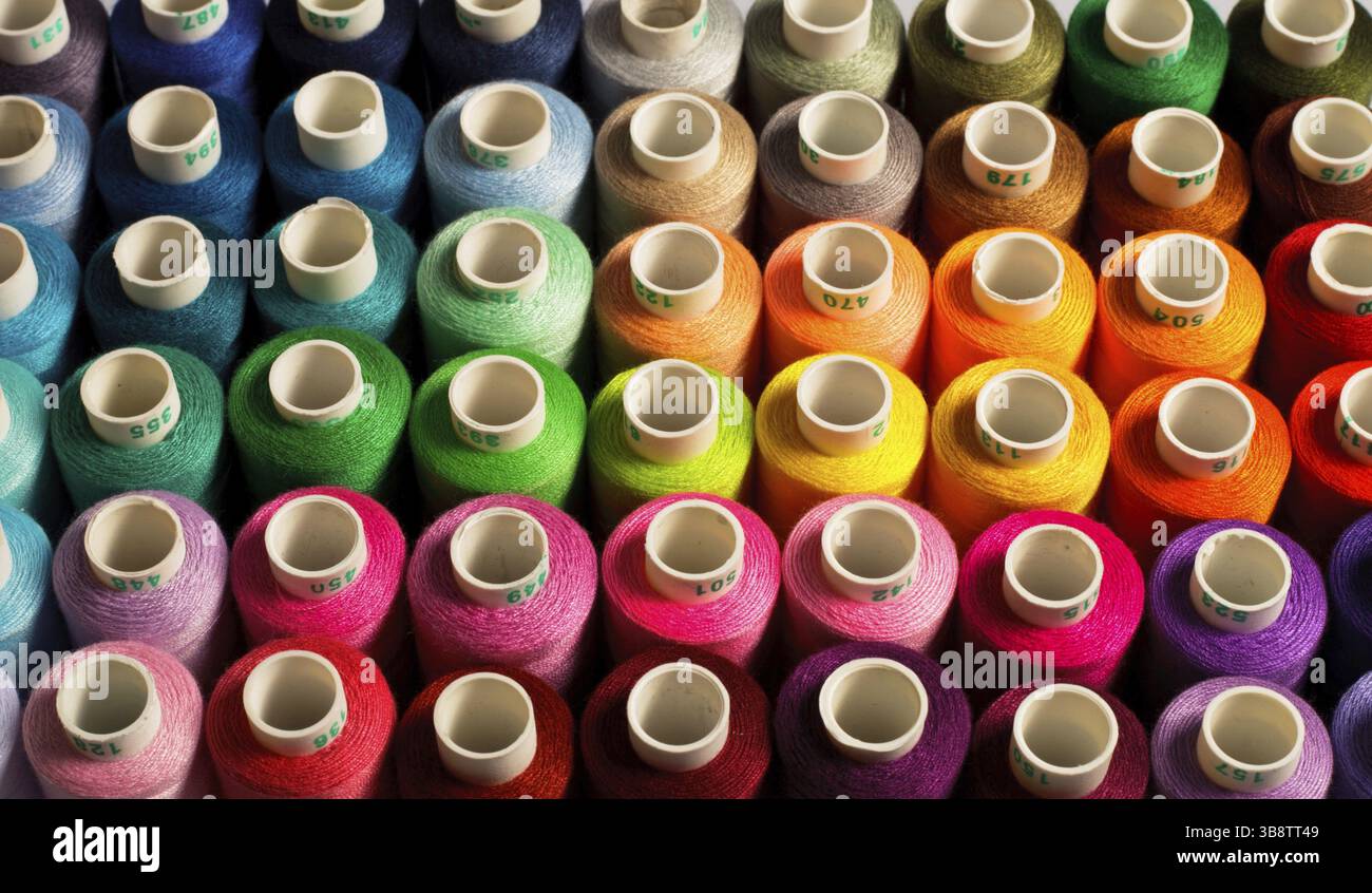 Sewing threads as a multicolored background close up Stock Photo