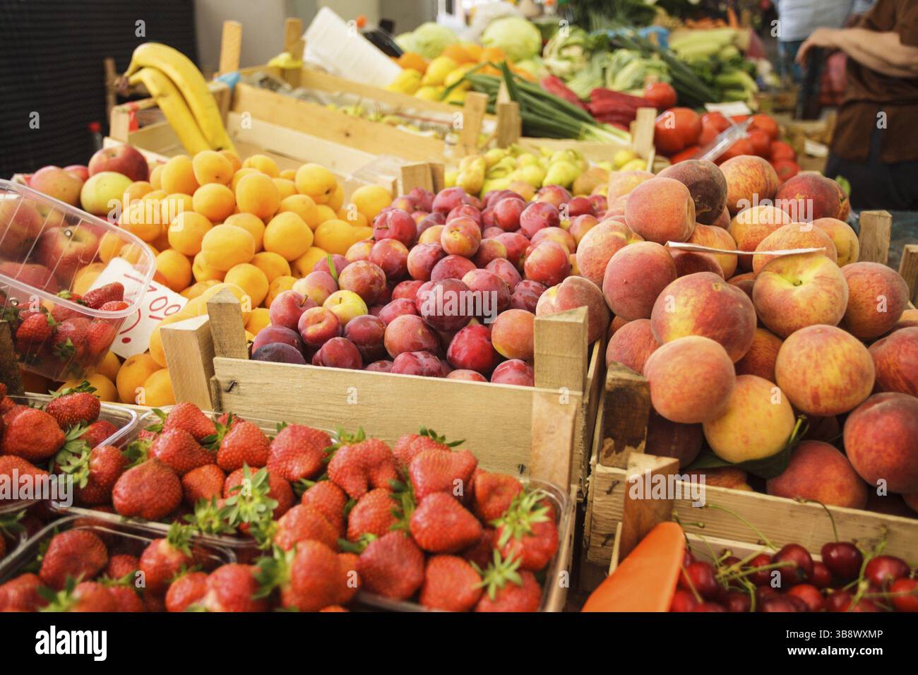 Various fresh fruits in boxes on the market Stock Photo - Alamy