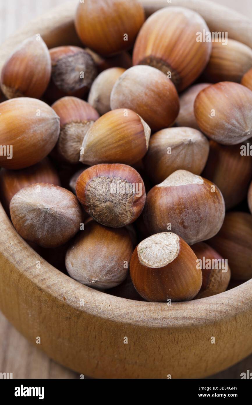 Ripe hazelnuts on the wooden table Stock Photo