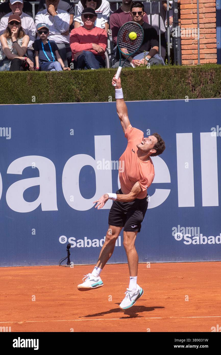 Pablo Carreno from Spain plays against Arthur Fils from France during their 1st round match at the ATP 500 Barcelona Open Banc Sabadell - Trofeo Conde Stock Photo