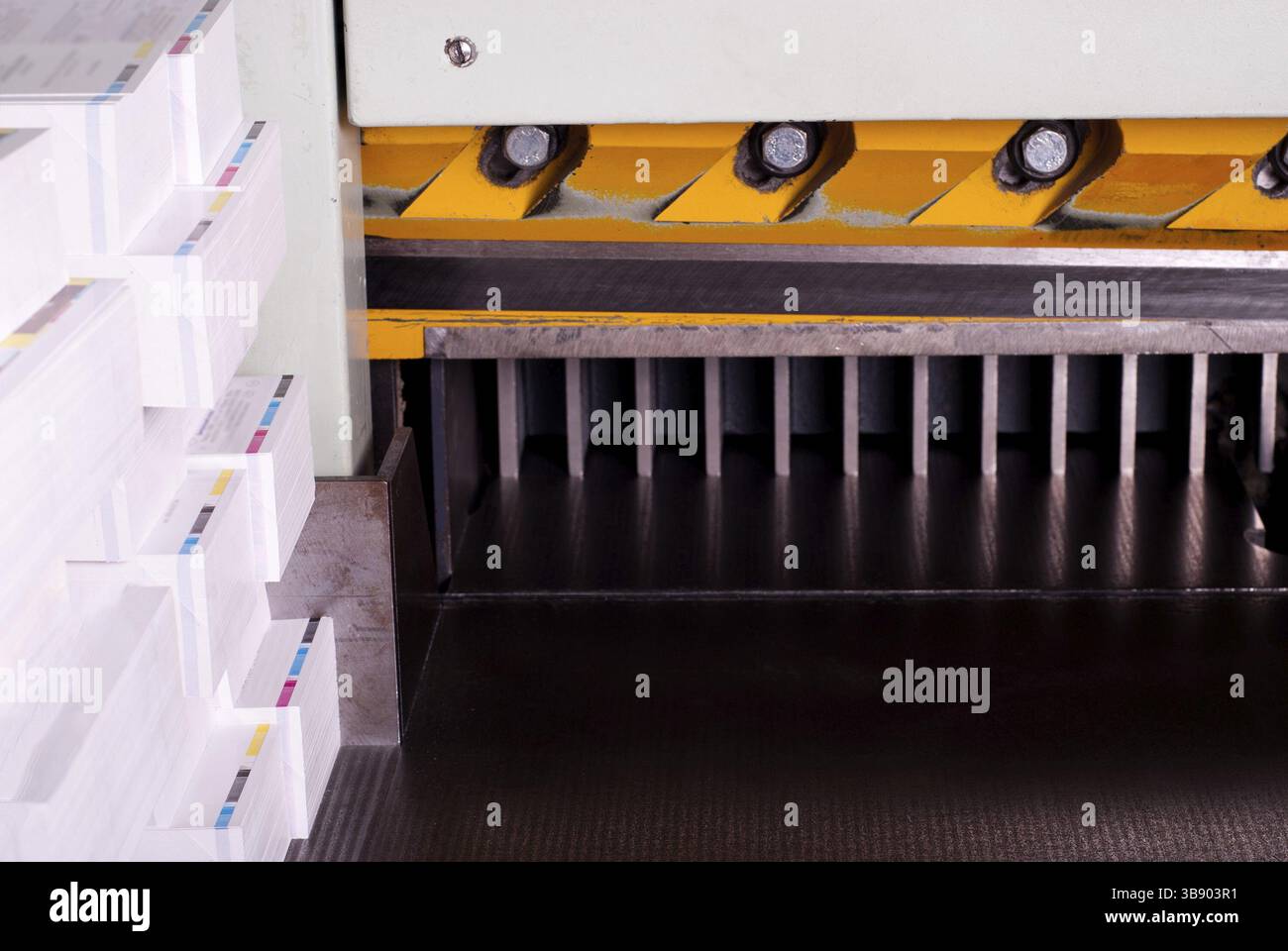 Paper stack prepared for side trimming, printing industry Stock Photo