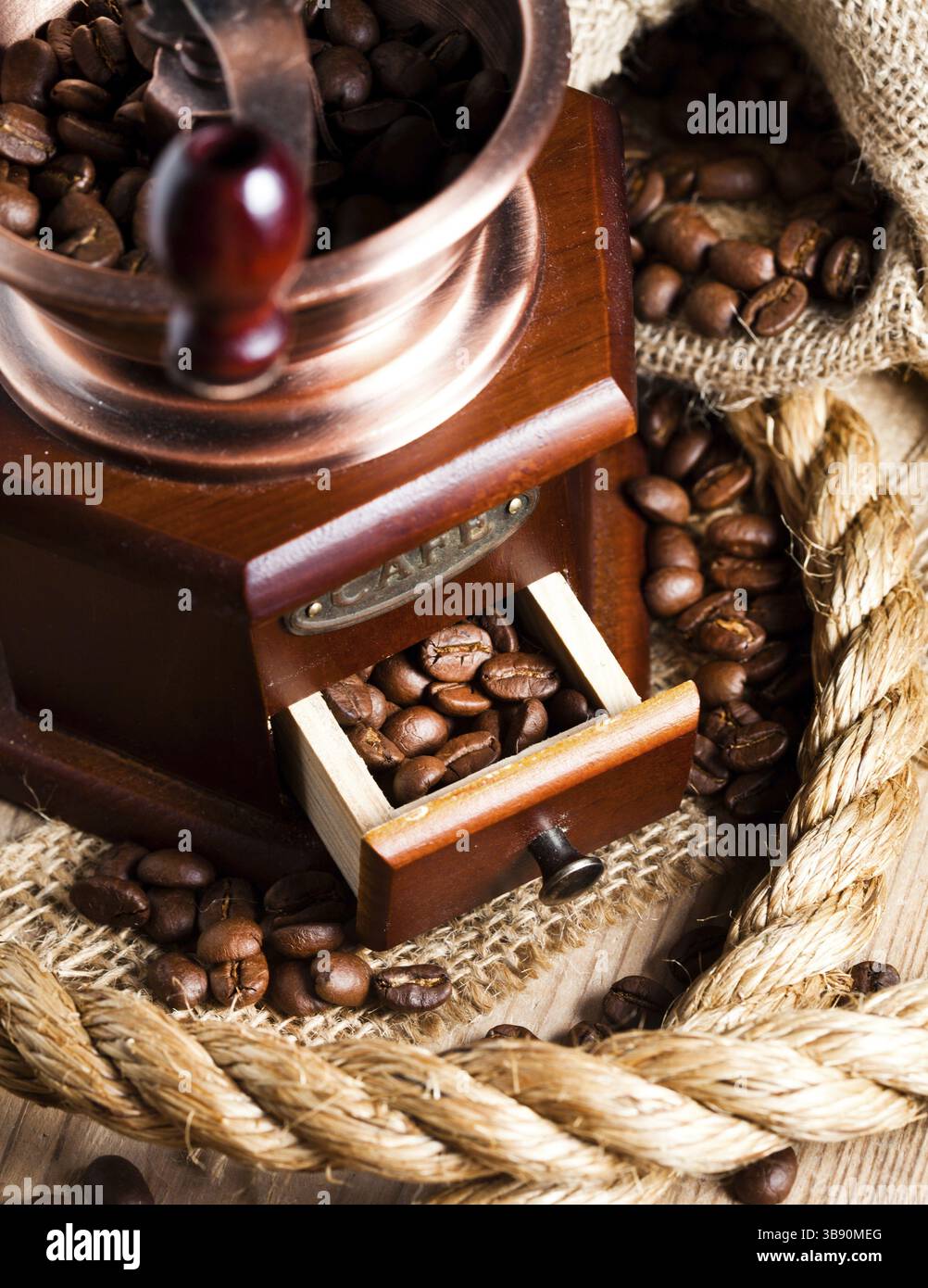 Coffee in grinder and rope still life Stock Photo