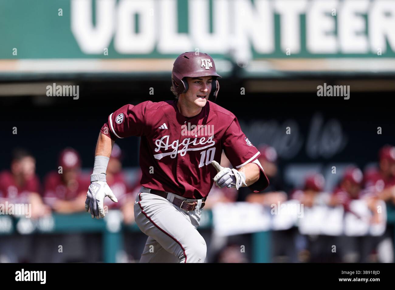 Texas A&M Aggies second baseman Ben Royo (10) hustles to first base ...