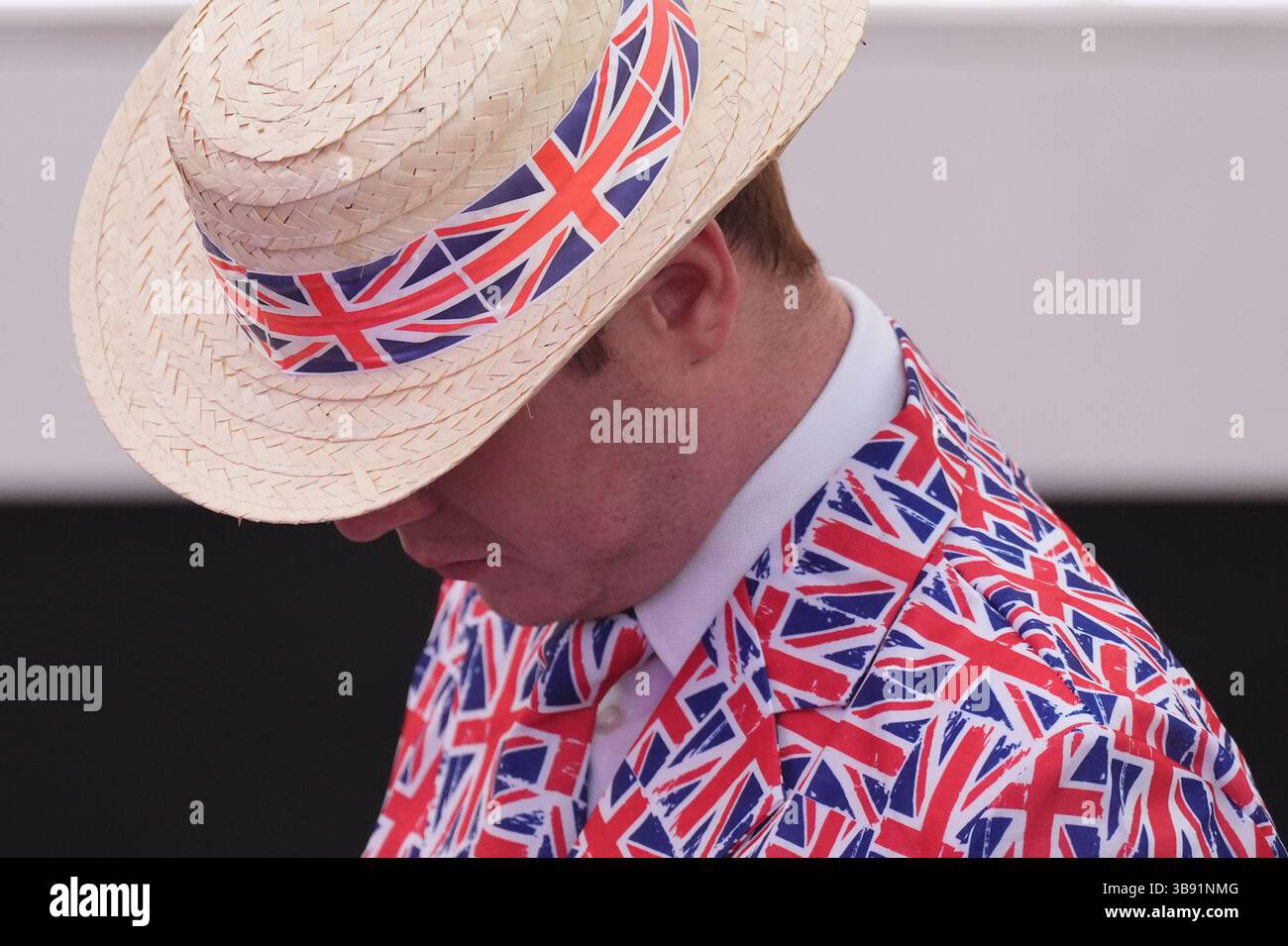 Members of the audience wearing patriotic outfits before the start of the concert celebrating the 80th Anniversary of VE Day, held at the historic Horse Guards Parade in central London. Picture date: Thursday May 8, 2025. Stock Photo