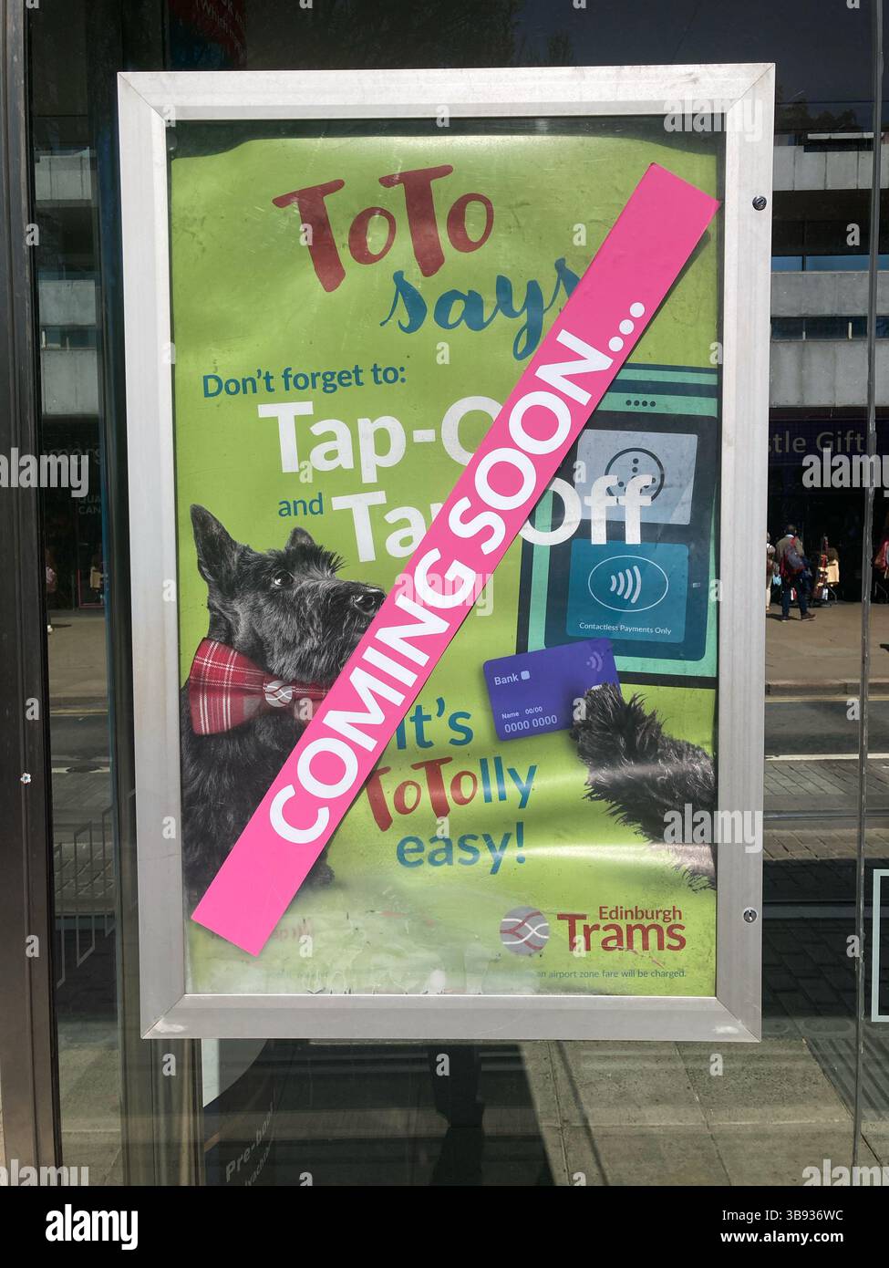 Publicity on the tram platform for the Tap on Tap Off system being implemented on Edinburgh Trams from the 19th May, Princes Street Edinburgh Scotland - Smartphone Captured Stock Image
