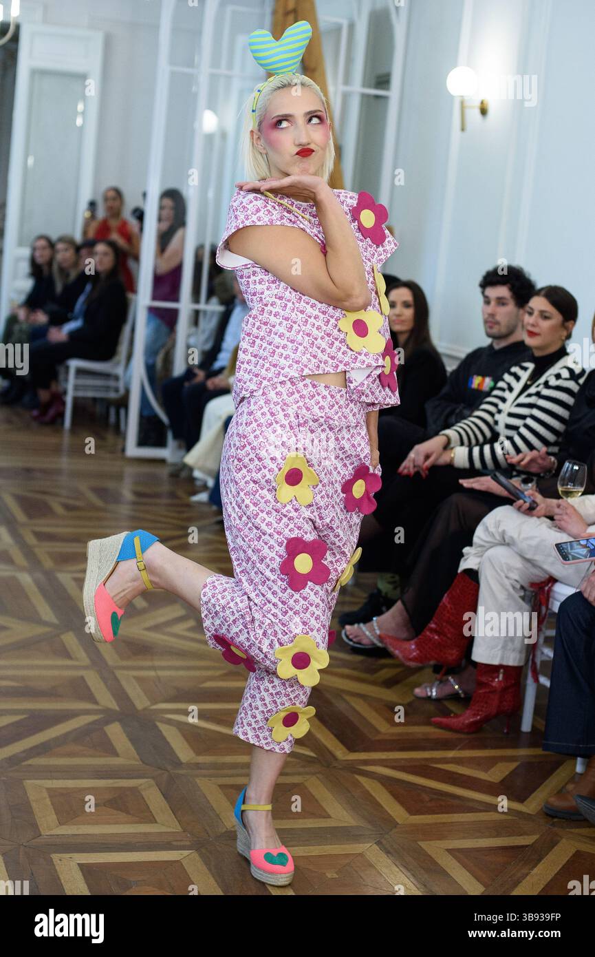 A Model Walks The Runway Wearing A Design Latino America During Fashion a-model-walks-the-runway-wearing-a-design-latino-america-during-fashion