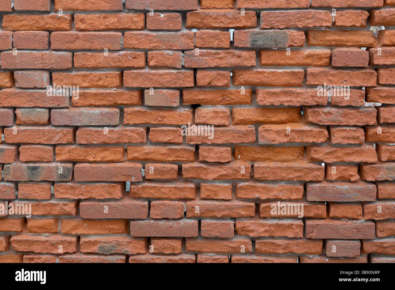 Textured Orange Brick Wall Background Stock Photo