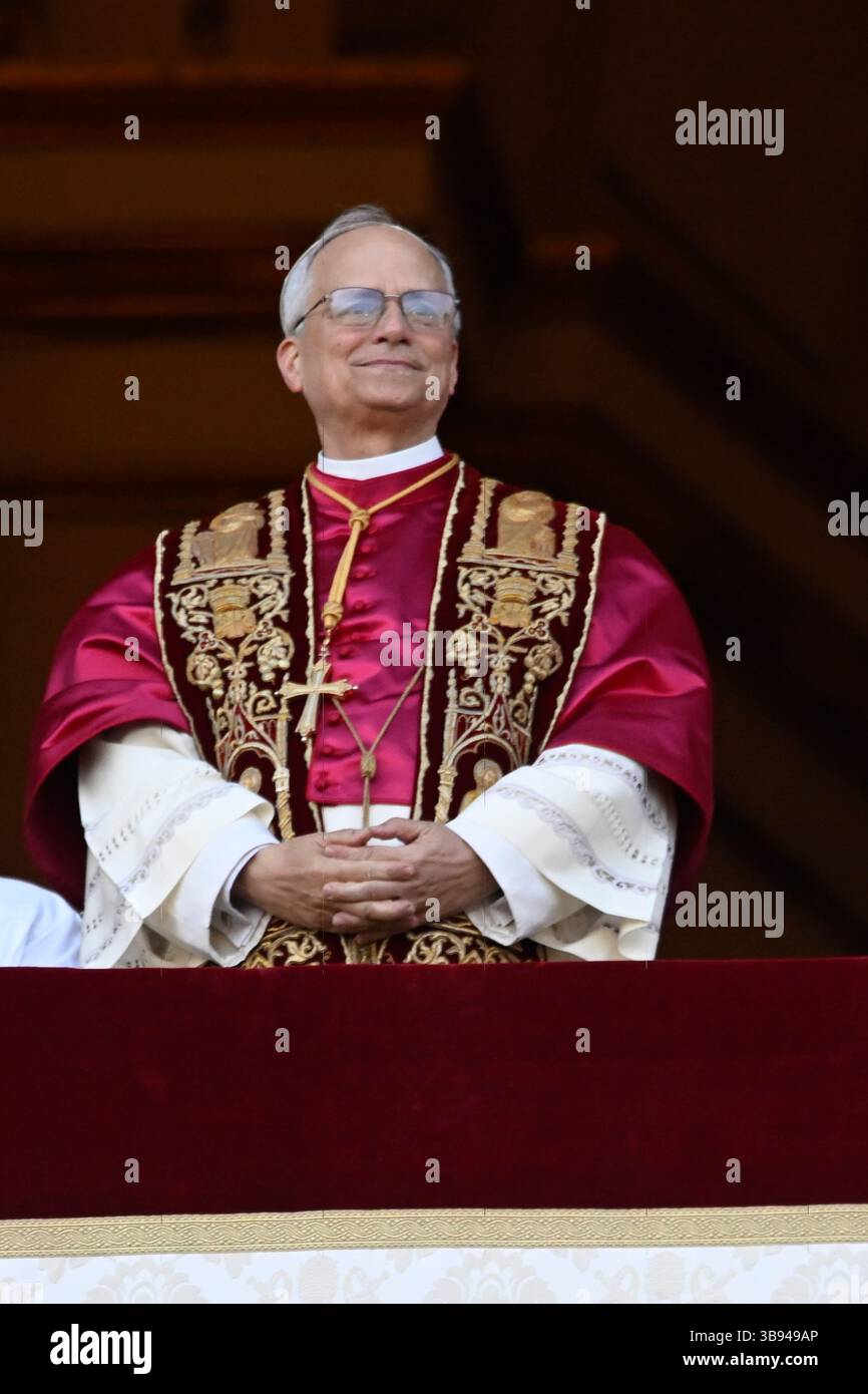 Newly elected Pope Leo XIV, Robert Prevost waves from the window of St Peter's Basilica's balcony after being elected the 267th pope of the Roman Catholic Church on May 8, 2025 at the Vatican. Stock Photo