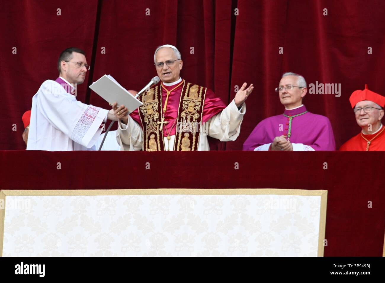 Newly elected Pope Leo XIV, Robert Prevost waves from the window of St Peter's Basilica's balcony after being elected the 267th pope of the Roman Catholic Church on May 8, 2025 at the Vatican. Stock Photo