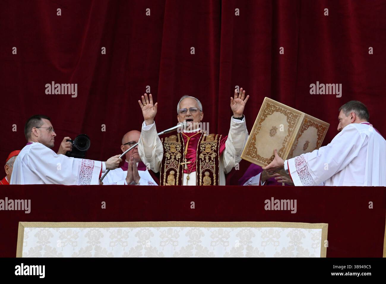 Newly elected Pope Leo XIV, Robert Prevost waves from the window of St Peter's Basilica's balcony after being elected the 267th pope of the Roman Catholic Church on May 8, 2025 at the Vatican. Stock Photo