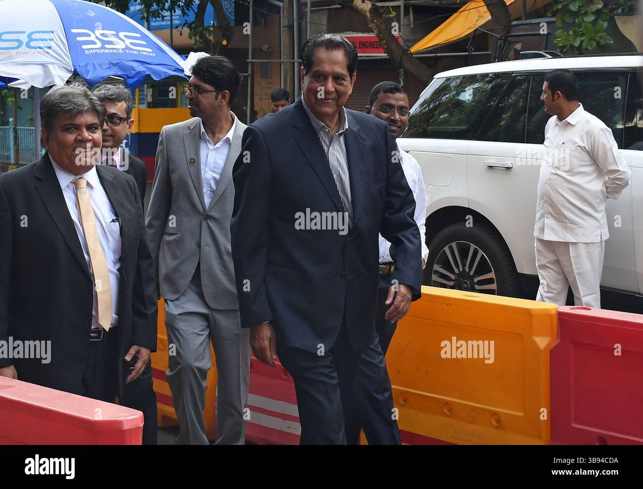 August 21, 2023, Mumbai, India: Independent Director and Non-Executive Chairman, Jio Financial Services Limited (JFSL), KV Kamath arrives at the listing ceremony of Jio Financial Services on the Bombay Stock Exchange (BSE) in Mumbai. Jio Financial Services (JFS) is the subsidiary of the Mukesh Ambani led Reliance Industries, listed for trading at the ceremony held at Bombay Stock Exchange (BSE) in Mumbai. (Credit Image: © Ashish Vaishnav/SOPA Images via ZUMA Press Wire) Stock Photo
