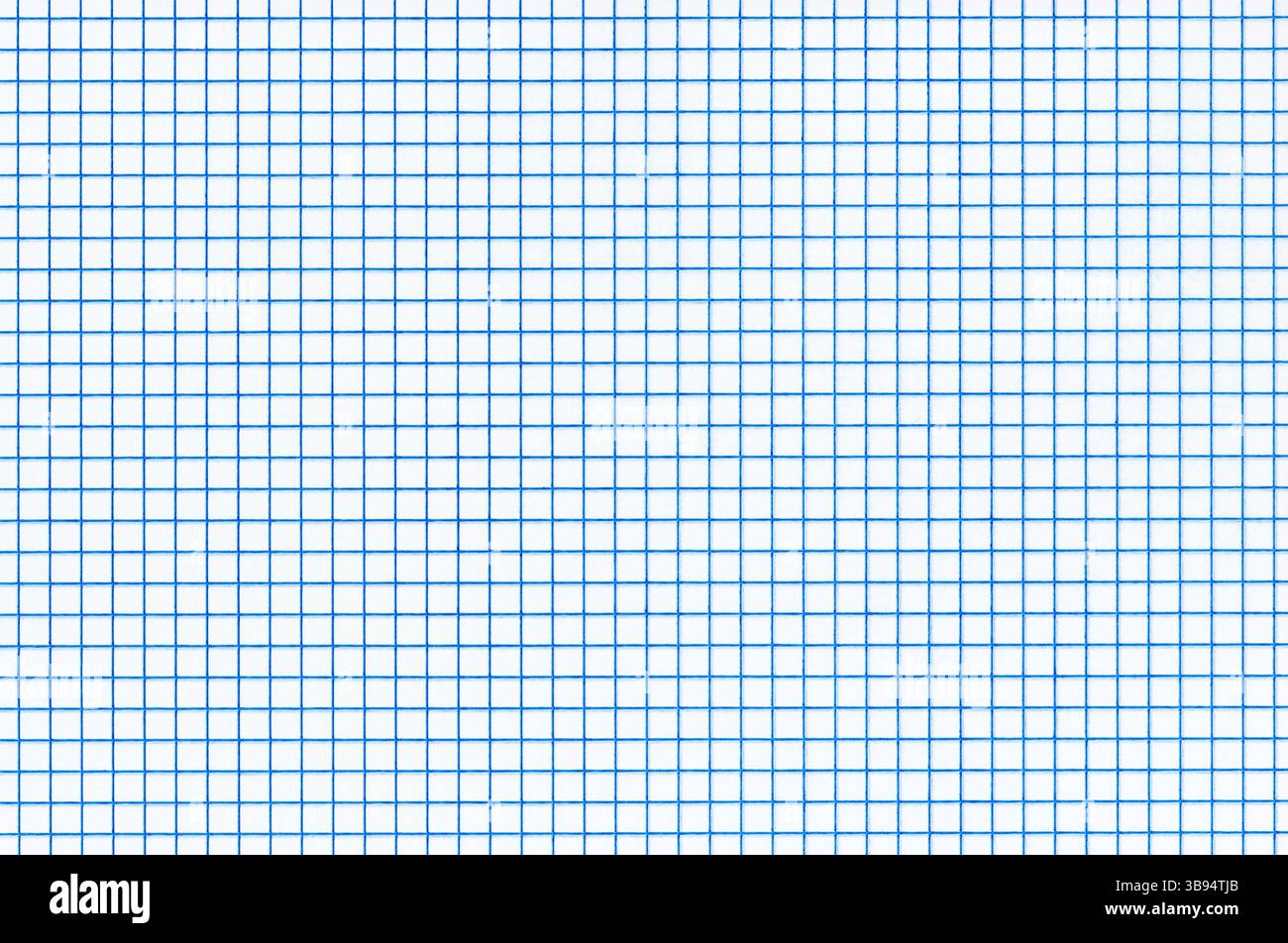 Blue lined graph or grid paper. Stock Photo