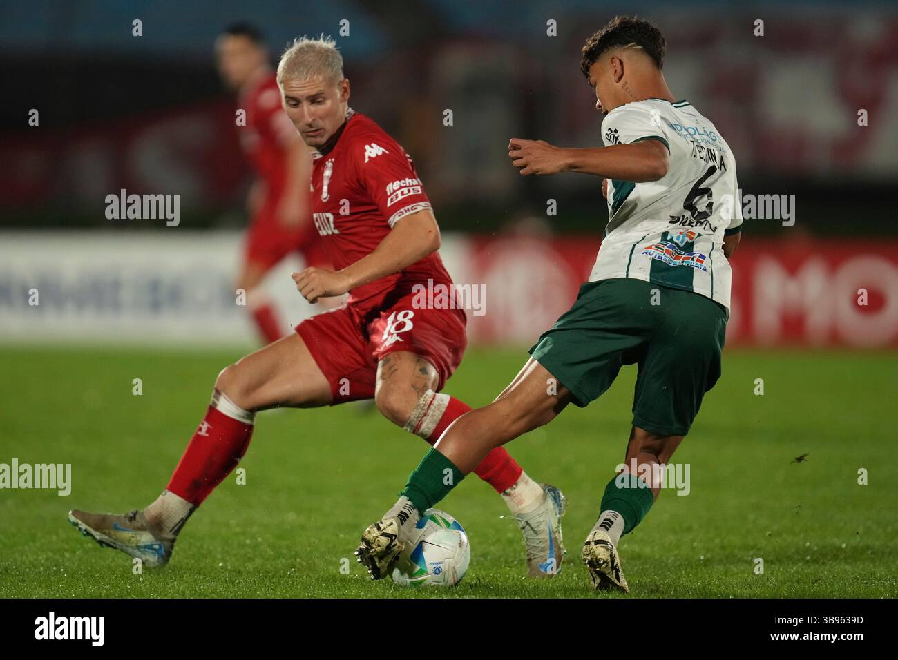 Miljevic Racing Matko Miljevic of Argentina's Huracan, left, defends Thiago Espinosa of ...