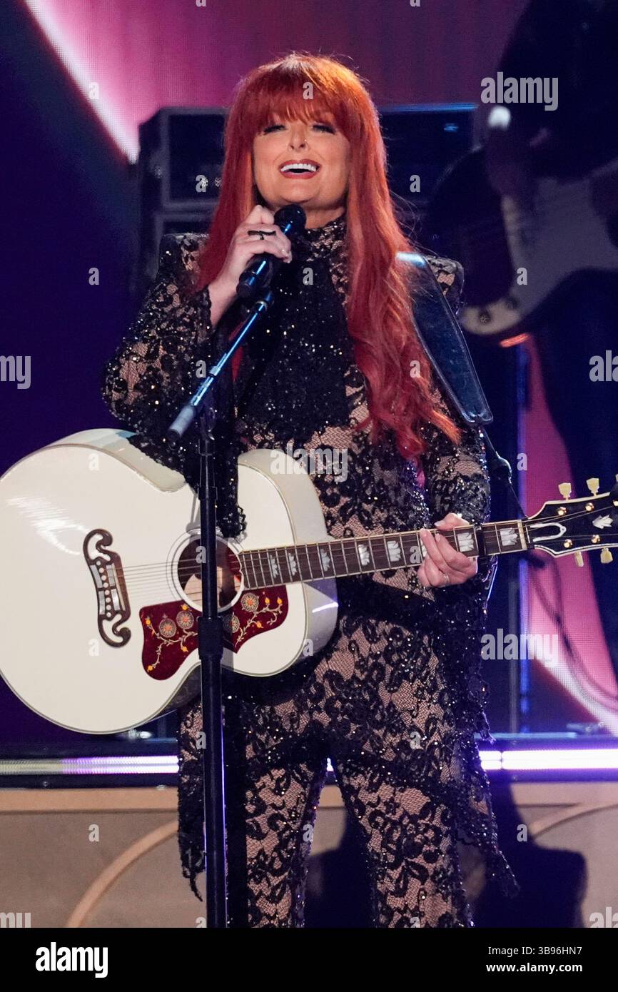 Wynonna Judd performs "Why Not Me" during the 60th annual Academy of