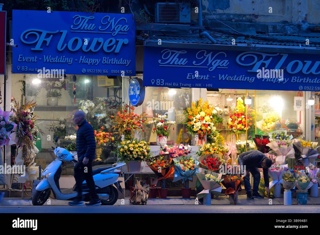 Present and Past - The vibrant life in Hanoi, capital of Vietnam VN Stock Photo