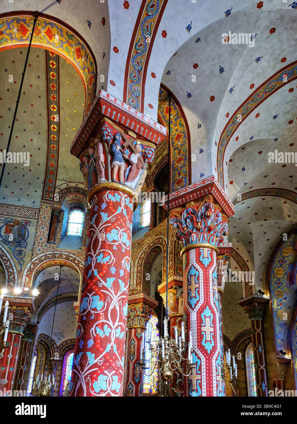 Issoire, colourful columns of the Roman abbatial, Abbey of Saint-Austremoine, Puy de Dome department, Auvergne Rhone Alpes, France, Europe - Smartphone Captured Stock Image