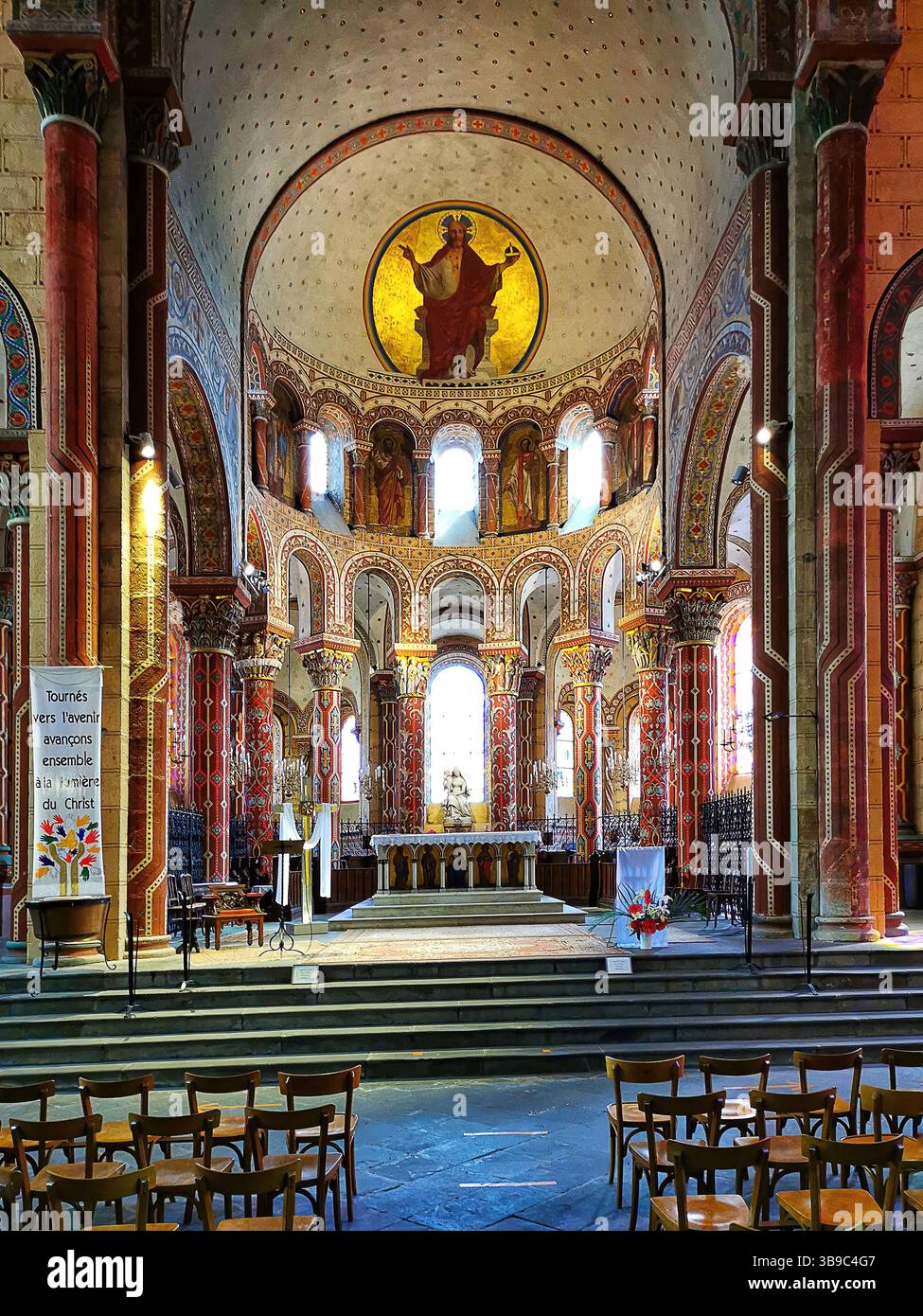 Issoire, colourful columns of the Roman abbatial, Abbey of Saint-Austremoine, Puy de Dome department, Auvergne Rhone Alpes, France, Europe - Smartphone Captured Stock Image