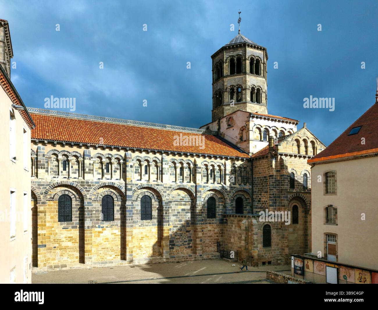 Architecture of Saint Austremoine Abbey in Issoire , romanesque art, Puy de Dome, Auvergne Rhone Alpes, France - Smartphone Captured Stock Image