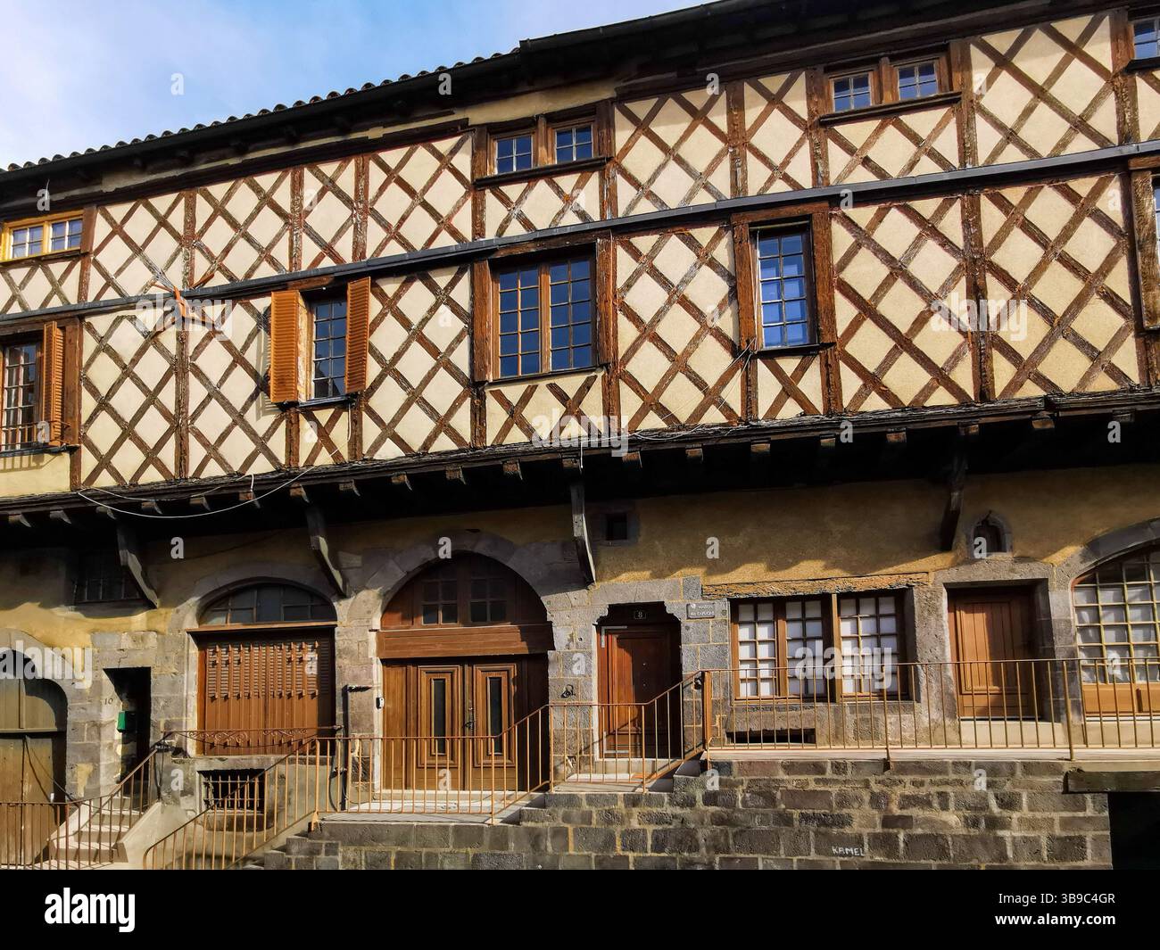 Charming half-timbered facade in the medieval quarter of Montferrand, Puy de Dome, Auvergne Rhone Alpes. France - Smartphone Captured Stock Image