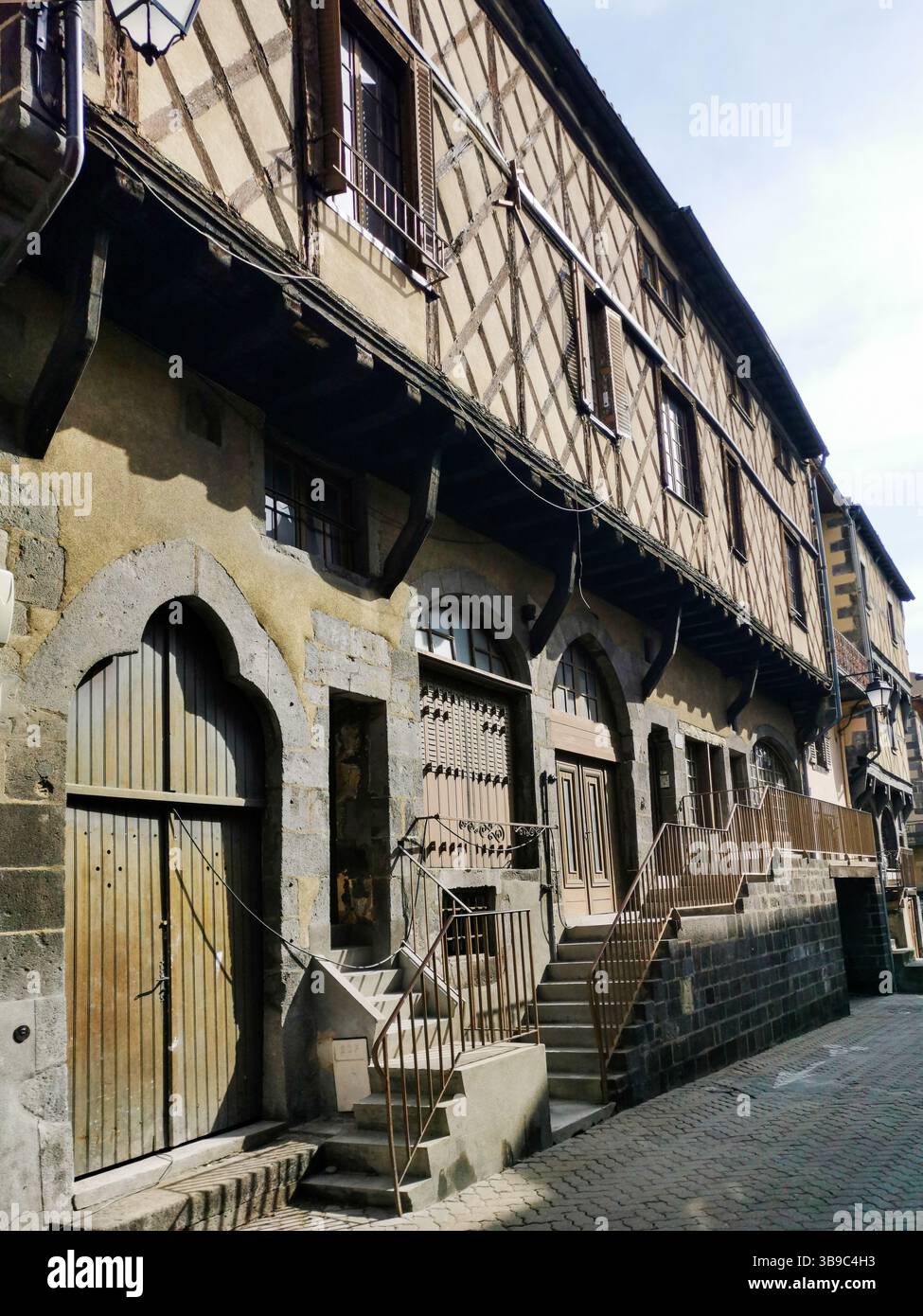 Charming half-timbered facade in the medieval quarter of Montferrand, Puy de Dome, Auvergne Rhone Alpes. France - Smartphone Captured Stock Image