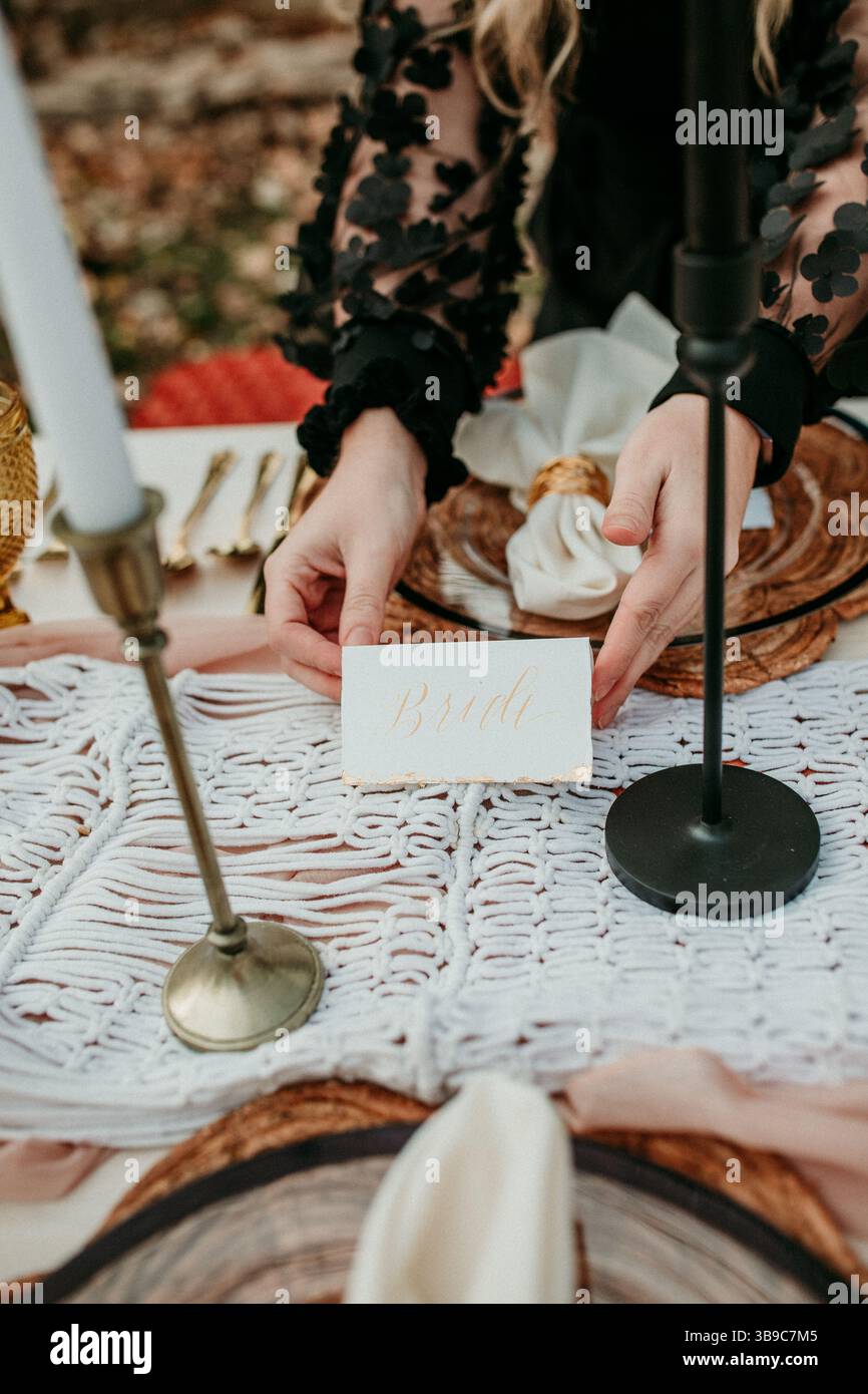 Fall Picnic Styling with Bride Tablesetting Stock Photo