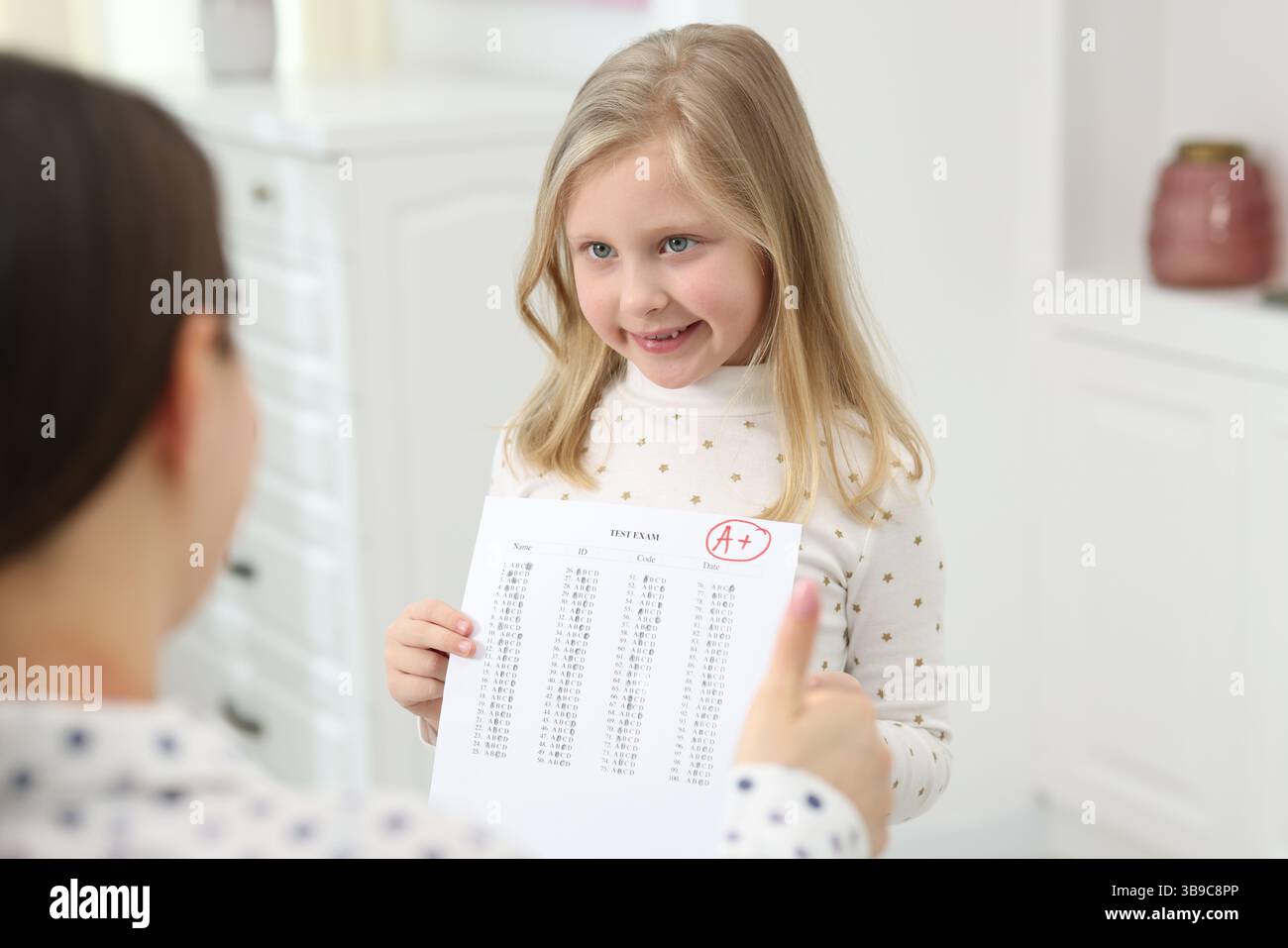Excellent Answers Images School grade. Happy girl showing answer sheet with excellent mark to ...