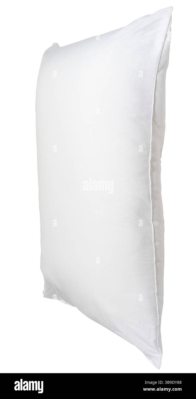 White pillow after use in hotel or resort room is isolated on white background with clipping path, Concept of comfortable and happy sleep Stock Photo