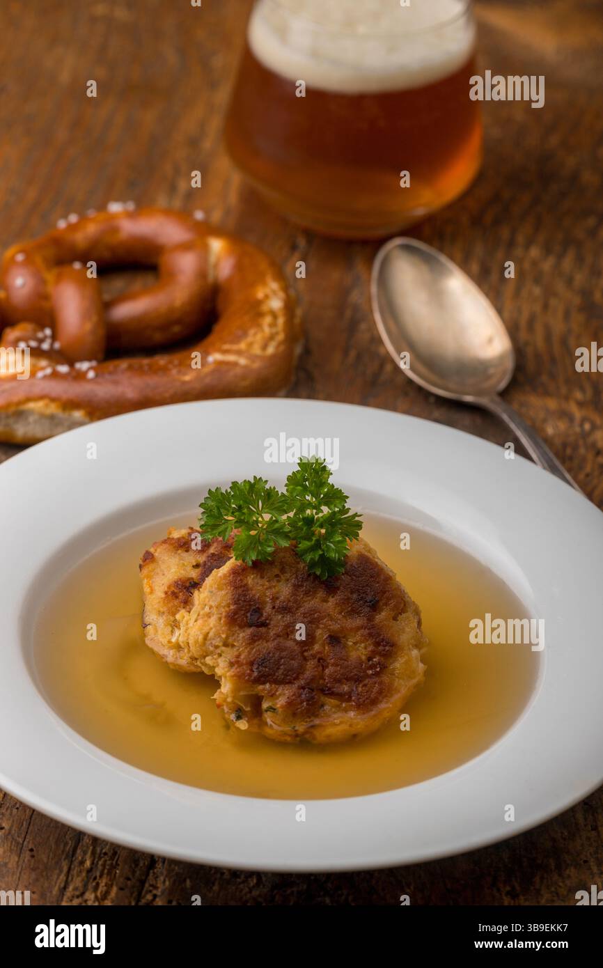 Austrian cheese dumpling in broth Stock Photo