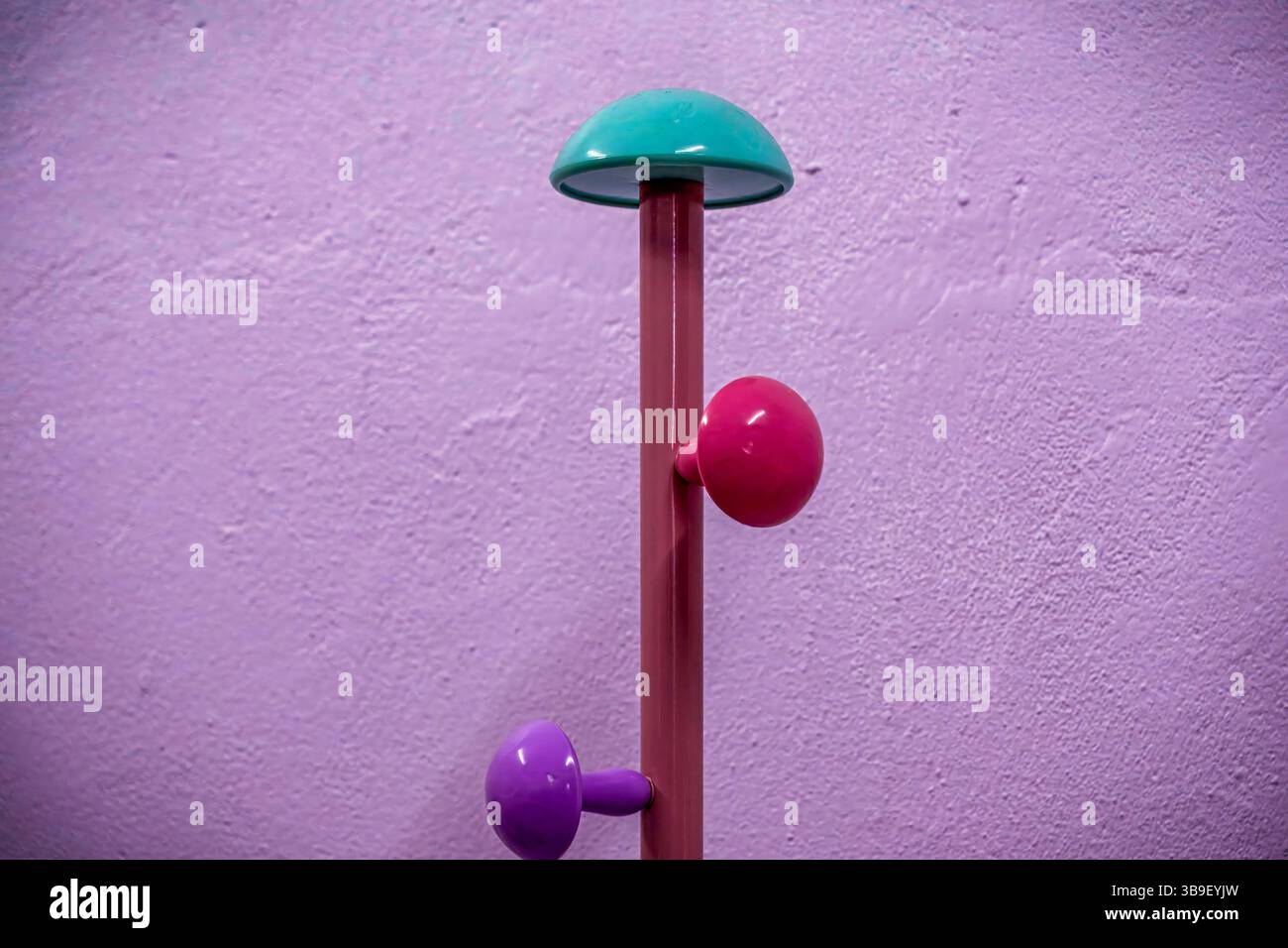 Purple Coat Rack Colorful modern coat rack with turquoise, pink, and purple knobs Stock ...