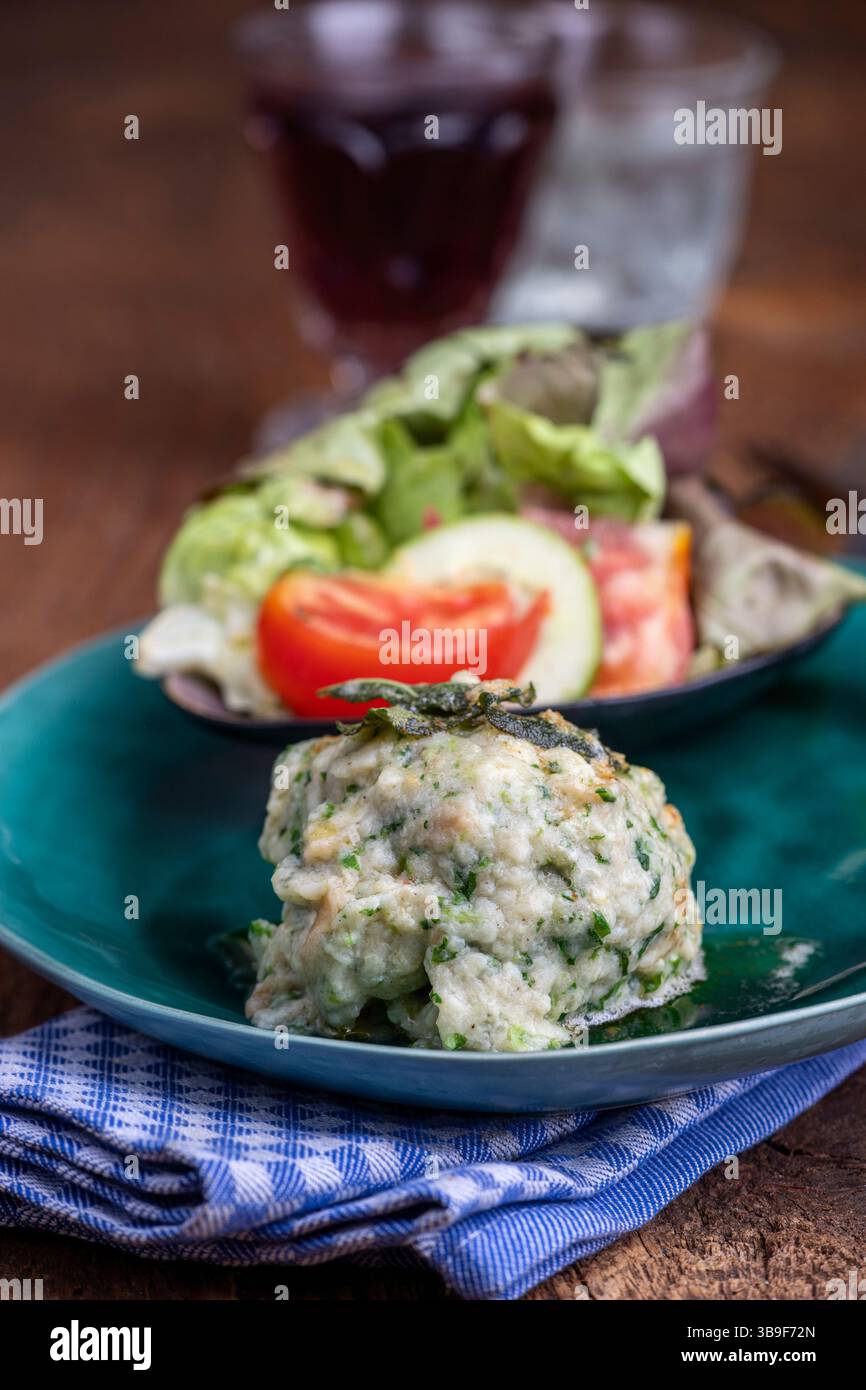 Rustic spinach dumpling with salad Stock Photo