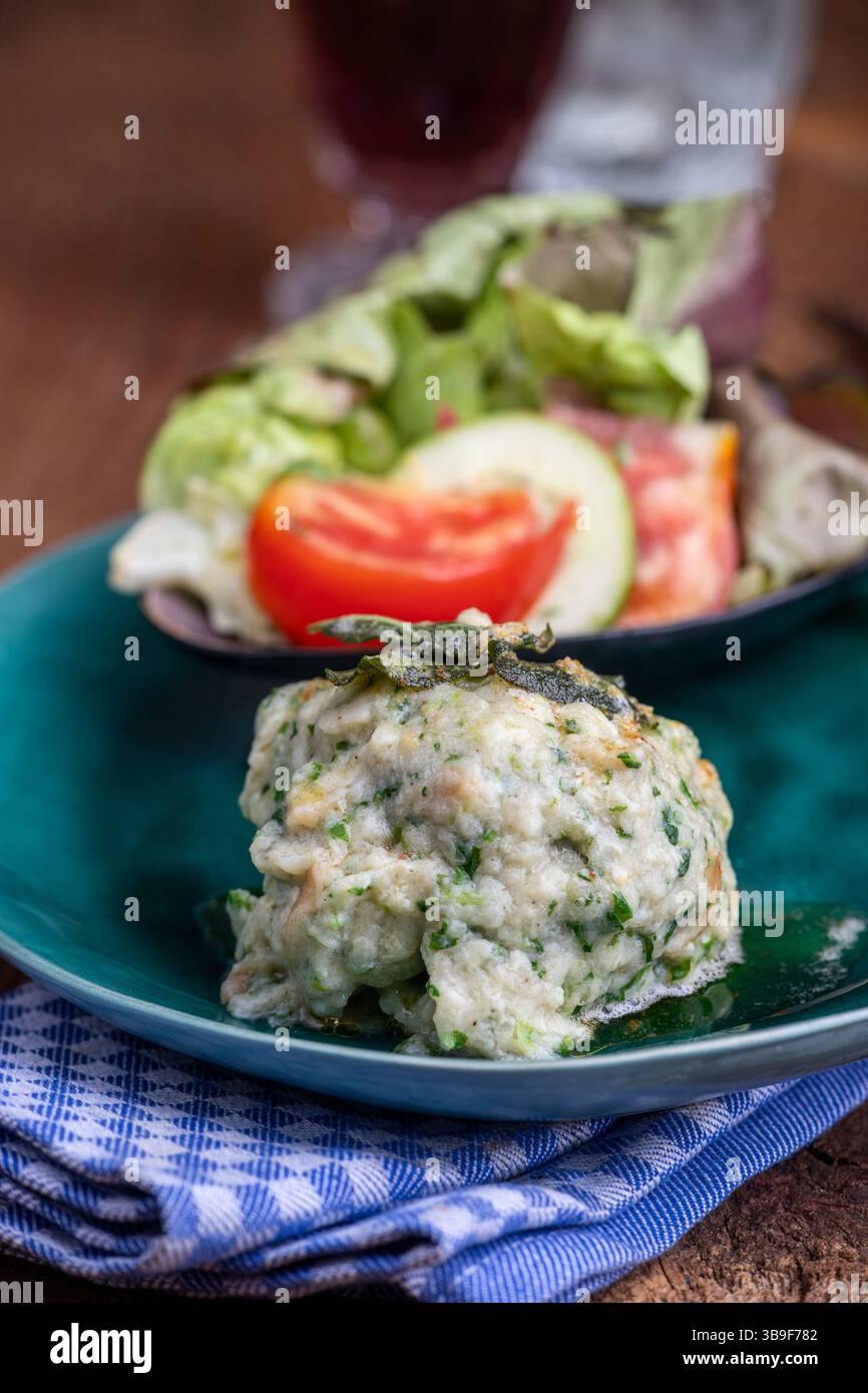 Rustic spinach dumpling with salad Stock Photo