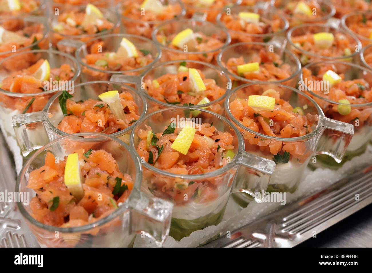 Salmon tartare with avocado puree and horseradish puree Stock Photo