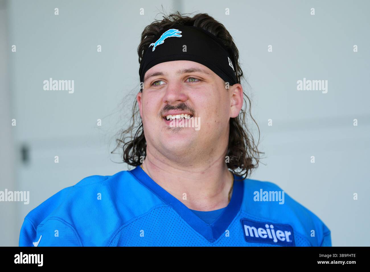 Detroit Lions offensive lineman Tate Ratledge smiles after the NFL ...