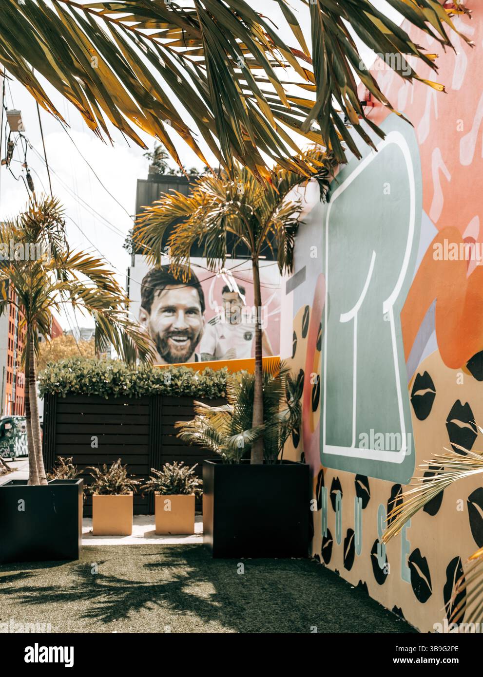 Miami, Florida, USA - April 16, 2025: A large mural in Miami’s Wynwood district features soccer star Lionel Messi in an Inter Miami jersey. Stock Photo