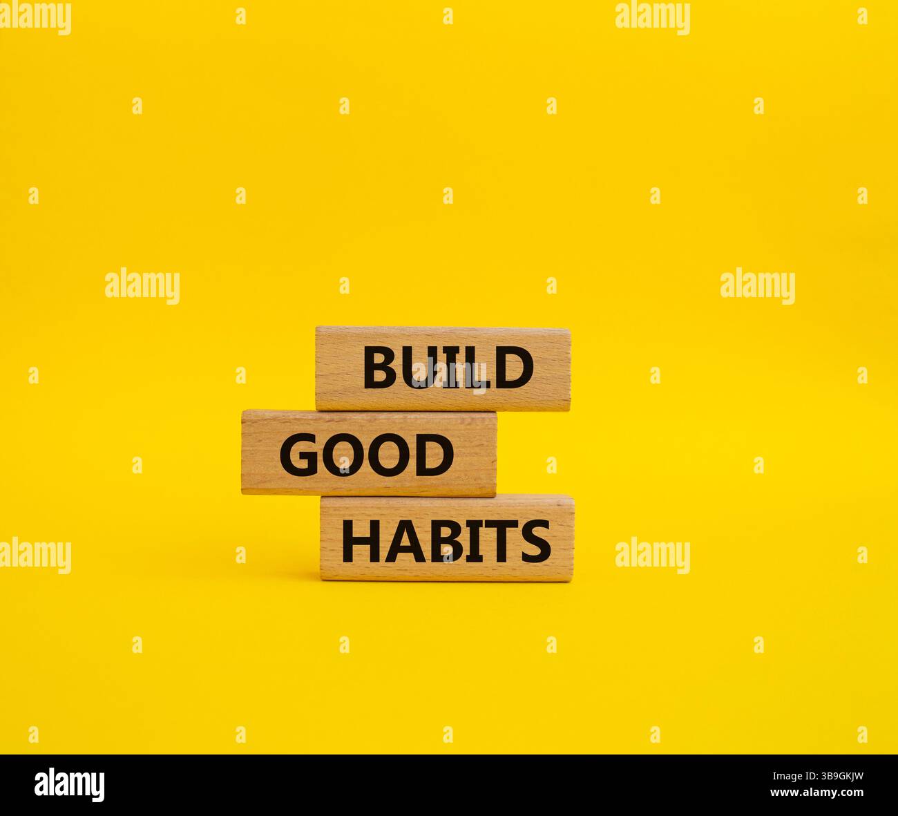 Build good habits symbol. Wooden blocks with words 'Build good habits ...
