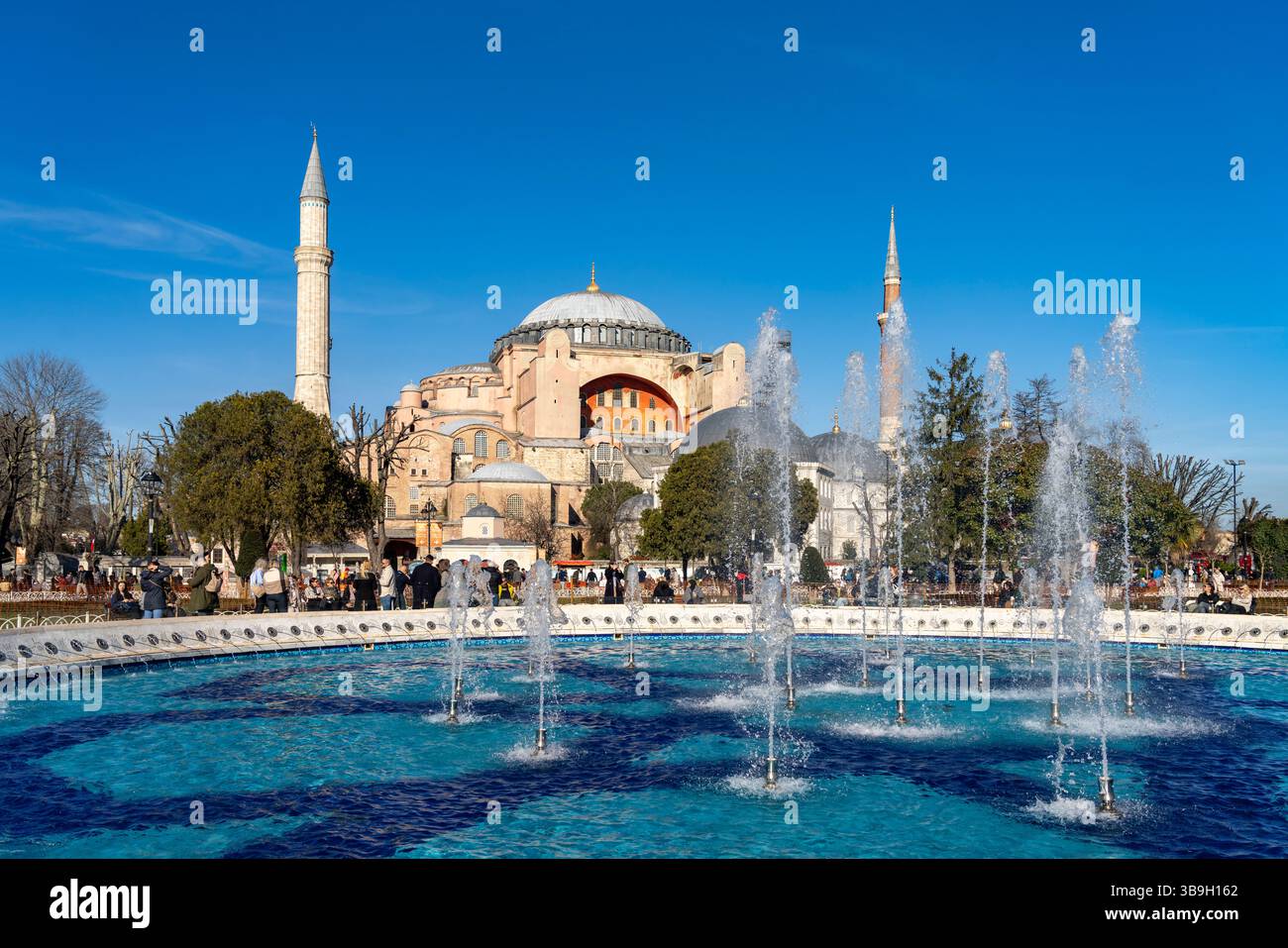 Fountain in Sultan Ahmet Park and the present-day Hagia Sophia Mosque ...