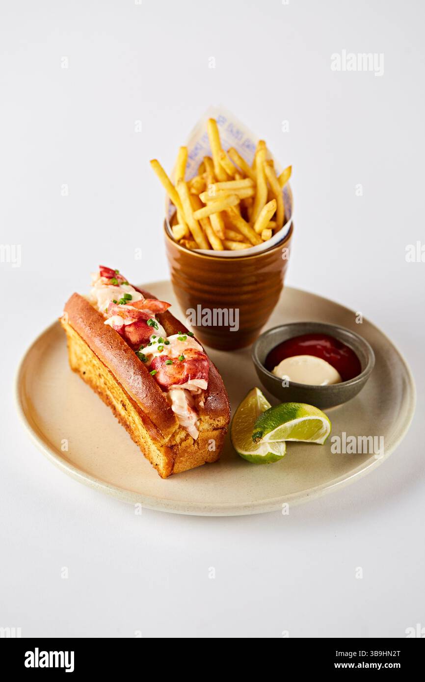 Lobster roll with chips and dips Stock Photo