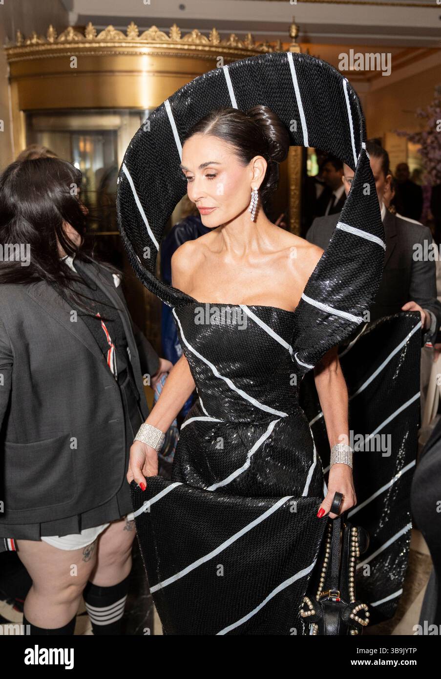New York - May 5, 2025: Demi Moore wearing dress by Thom Browne departs ...