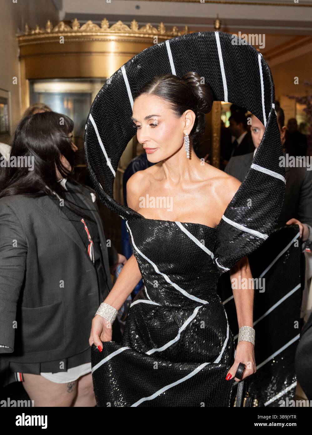New York - May 5, 2025: Demi Moore wearing dress by Thom Browne departs ...