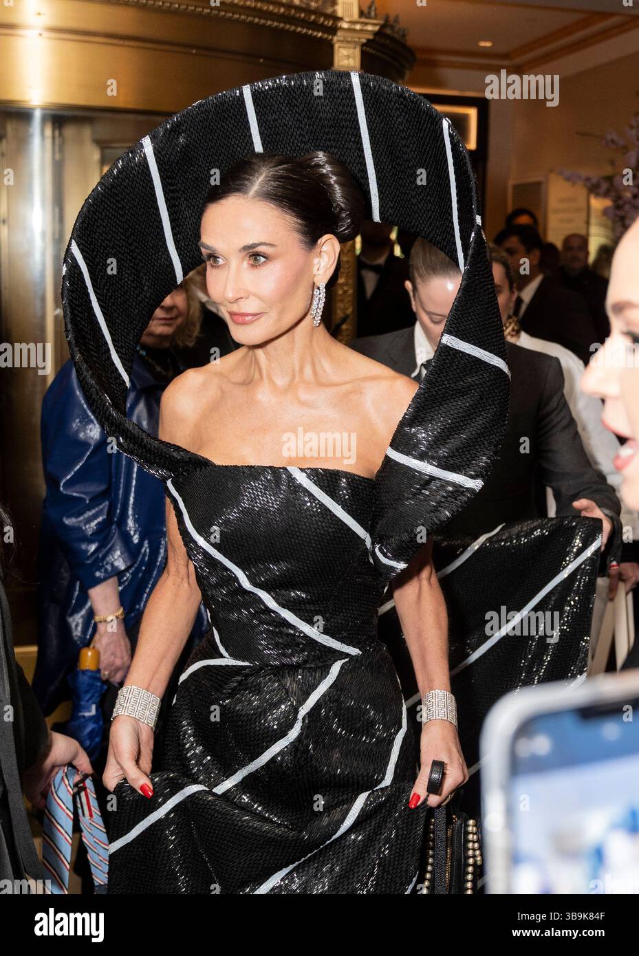 New York - May 5, 2025: Demi Moore wearing dress by Thom Browne departs ...