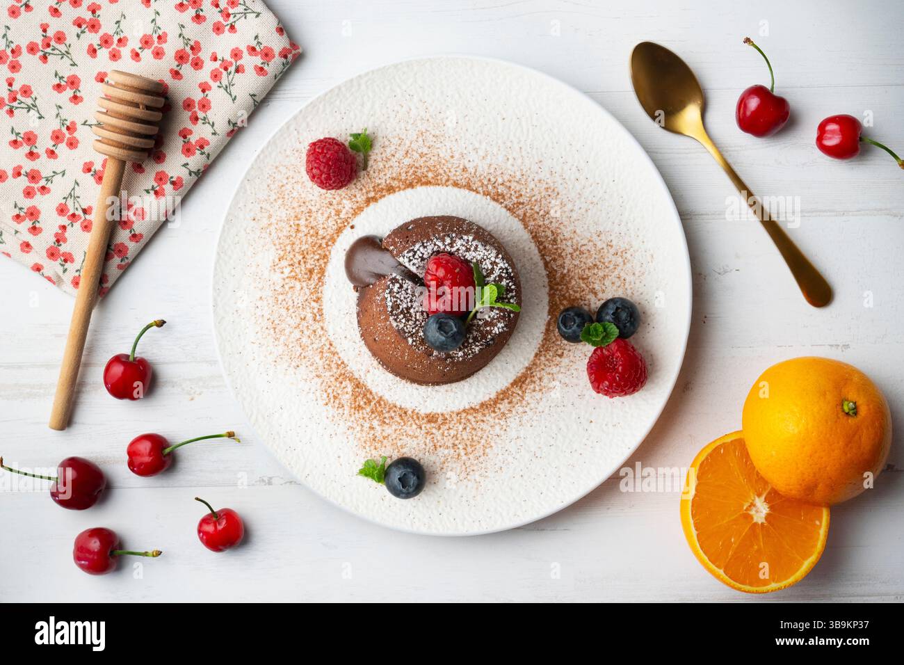 Beautiful chocolate lava cake coulant from a top view with christmas decorations. Stock Photo