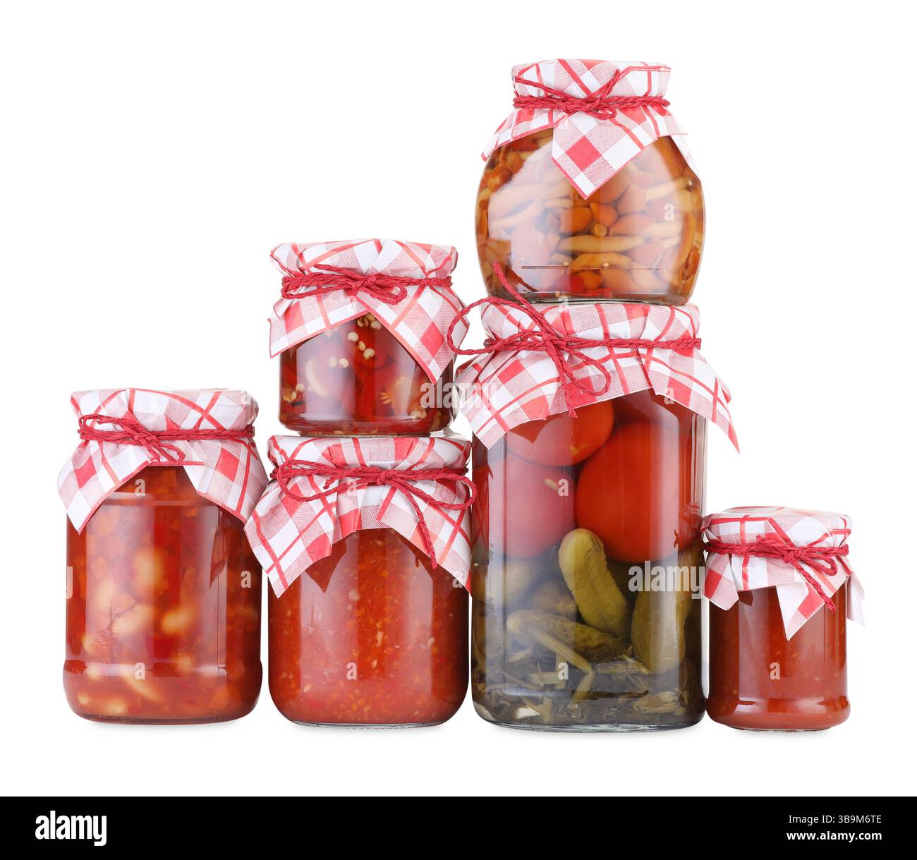 Many jars with different pickled products isolated on white Stock Photo
