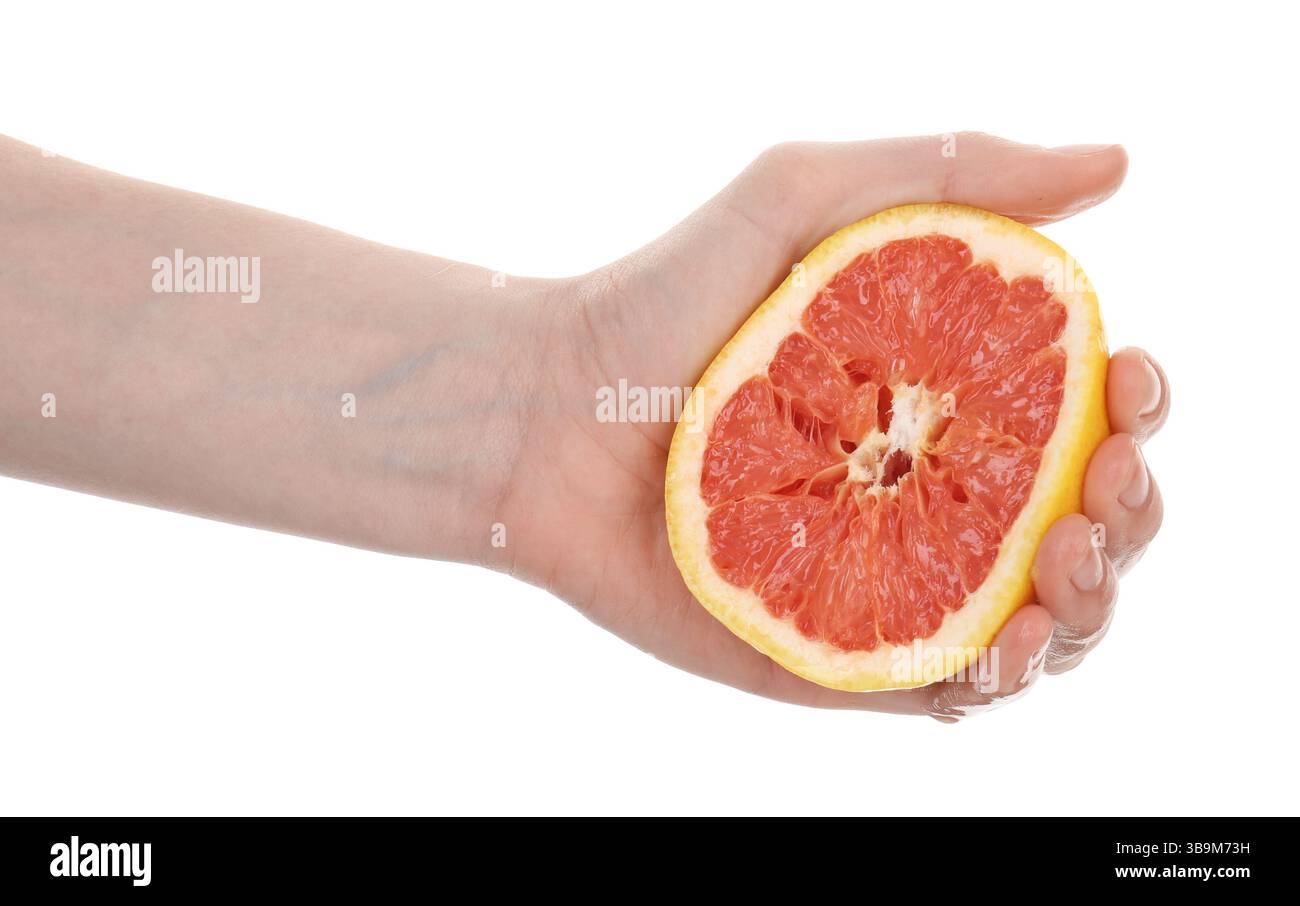 Woman squeezing grapefruit on white background, closeup Stock Photo