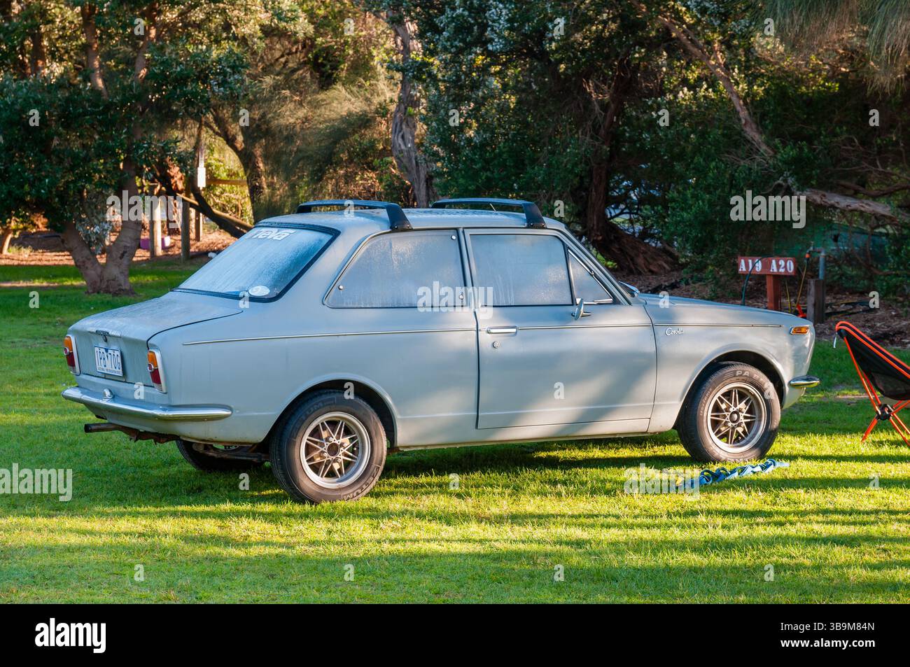 Old, vintage, Toyota Corolla, 1970-74, at a Campsite, Australia Stock Photo
